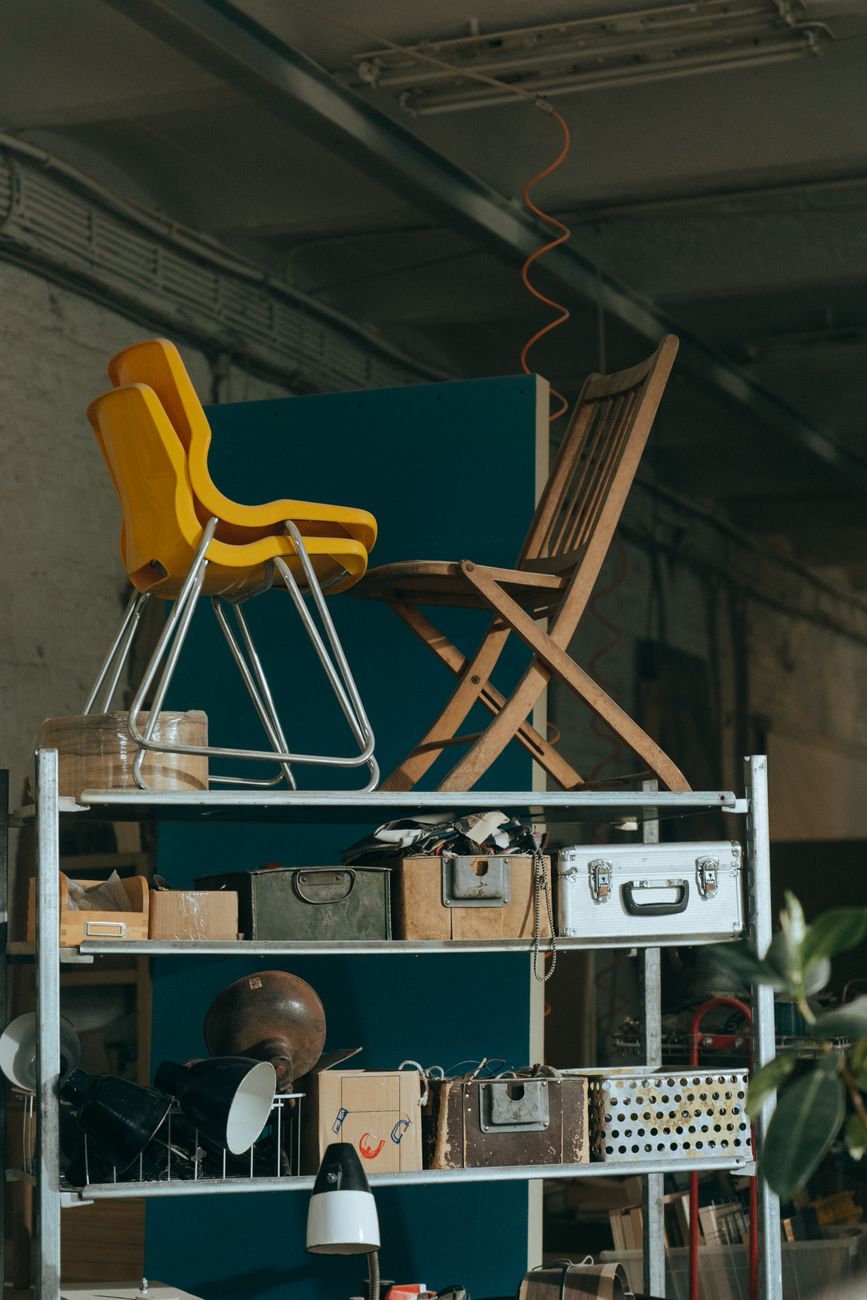 Furniture and objects stacked in a storage space
